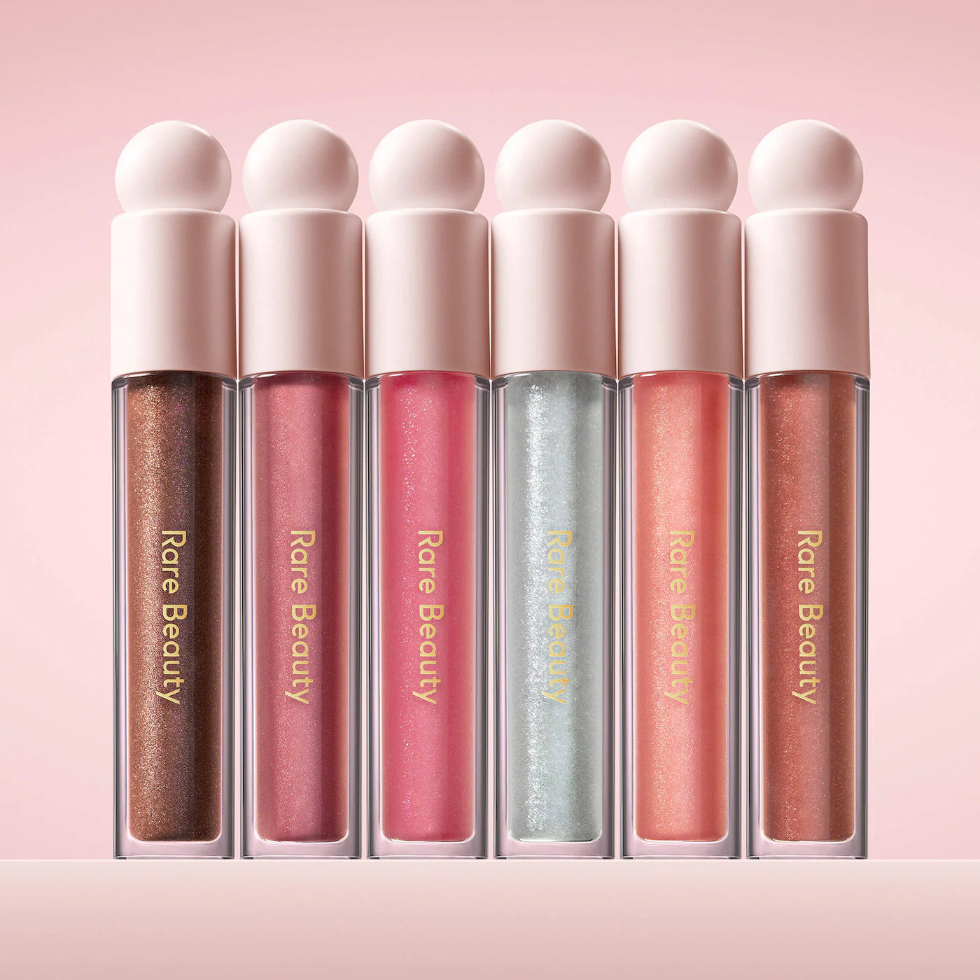 Pre-order: Rare Beauty by Selena Gomez | Positive Light Luminizing Lip Gloss